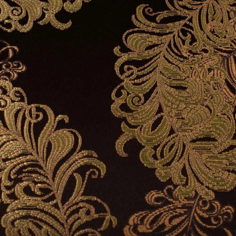 Ekskluzywny materiał obiciowy Diva z bogatym, błyszczącym złotym ornamentem na ciemnym tle